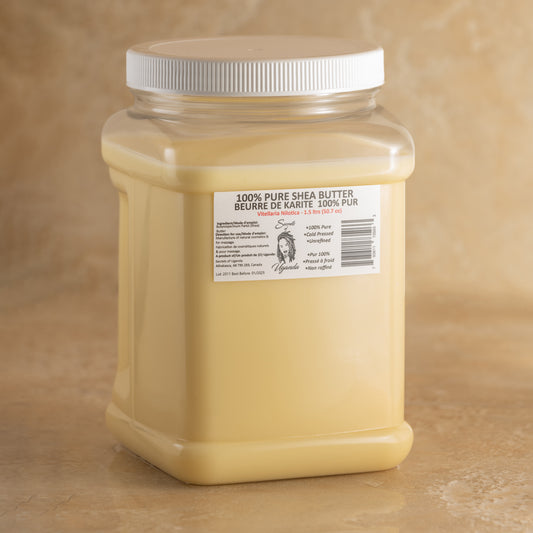 1500ml Tub of Nilotica Shea Butter on a Brown Background